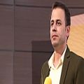 عکس اجرای علی کارونی در شب شعر و موسیقی بزم رزم اهواز