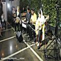 عکس گروه دلنوا - تکنوازی سه تار بین قطعات