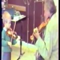 عکس Le grand violoniste IVRY GITLIS avec les petits enfants