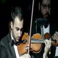 عکس تکنوازی ویولن عربی بسیار زیبا از کنسرت سمفونیک بین المللی