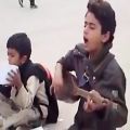 عکس قاصدان آزادی : کودک خیابانی در ایران که ترانه برای مرگش می خواند