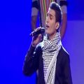 عکس اجرای خواننده فلسطینی قبل شروع مراسم افتتاحیه جام جهانی