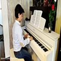 عکس گتمه گتمه نوازندگی پیانو توسط کیارش شینی پور