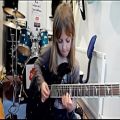 عکس دختر8ساله گیتاریست حرفه ای