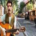 عکس گیتار زدن حمید هیراد تو خیابون های تهران