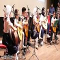 عکس آموزش گیتار کودک در آموزشگاه موسیقی گام کرج