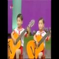عکس گیتار زدن گروهی کودکان 4 ساله
