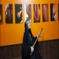 عکس سه تار نوازی آزاده امیری در قطعه رنگ ماهور اثر استاد حسین علیزاده