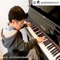 عکس پیانو زدن فوق العاده پسر نابینا