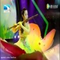 عکس نوازندگی بزرگترین فلوت دنیا در چین، نوازنده ناشناس