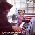 عکس پیانو زدن علی زندوکیلی و خوانندگی کودکی شش ساله
