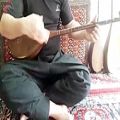عکس آموزش آهنگ جعفرقلی بادوتار توسط استاد رحیم رضایی