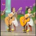 عکس گیتار زدن دختر بچه