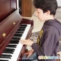 عکس کوروش هنرمند پیانیست 11 ساله