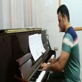 عکس تکنوازی پیانو - پاییز از فریبرز لاچینی - رضا نیک بخش
