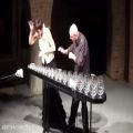 عکس اجرای دونفره قطعه ای از چایکوفسکی با چنگ شیشه ای، نوازندگان ناشناس