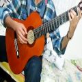 عکس اجرای زیبا با گیتار از یک هنرمند ساوه ای( کیفیت بالا )