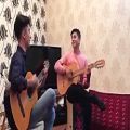 عکس اجرای اهنگ ترکمنی سارقیز توسط گیتاریست جوان ترکمن صحرا اقای طاهاکر