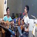 عکس اجرای اهنگ یکی توی دلمه توسط گیتاریست جوان اقای طاهاکر و اقای جمیل تقانپور