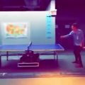 عکس هری و نایل در حال بازی کردن پینگ پونگ