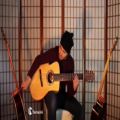 عکس اجرای زیبای موسیقی متن فیلم آخرین موهیکان با گیتار