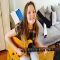 عکس آموزش گیتار|آموزش گیتار به کودکان|آموزش موسیقی( حالتِ نشستن و گرفتن گیتار )