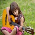 عکس آموزش گیتار|آموزش گیتار کلاسیک|آموزش گیتار به کودکان( نواختن سبک کلاسیک )