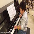 عکس شایان جواهریان هشت ساله نوازنده پیانو