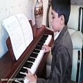 عکس بهاردلنشین نوازندگی پیانو توسط امیرحسین احمدیان