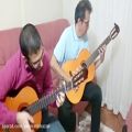عکس همنوازی گیتار کلاسیک با یکی از هنرجویان
