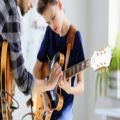 عکس آموزش گیتار|آموزش گیتار کلاسیک|آموزش گیتار به کودکان( نحوه نواختن آکورد G )