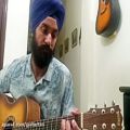 عکس اجرای قطعه مالاگوئنا با تنظیم استاد امیر کریمی توسط نوازنده هندی گیتار آکوستیک