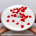 عکس اسلایم خامه ای شیری با جینگیلی های قلب