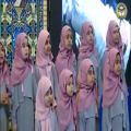 عکس اجرای سرود جمعی از فرزندان شهدای مدافع حرم در حضور رئیس جمهور