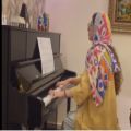 عکس اجرای قطعه moon light بتهوون توسط رعنا موسی زاده از مربیان آموزشگاه پیانو پدال