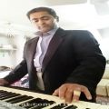 عکس نوازندگی پیانو باکرگ pa50توسط(حجت الله کاراندیش)