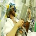 عکس نواختن گیتار در حین جراحی مغز