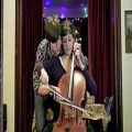 عکس یك ویولن سل و دو نوازنده