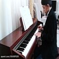عکس حسودی نوازندگی پیانو توسط امیرحسین احمدیان