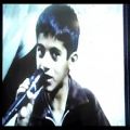 عکس خوندن آهنگ کردی توسط میلاد بهمنی عزیز در پنج سالگی