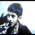 عکس پنج سالگی میلاد بهمنی و خوندن آهنگ کردی