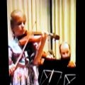 عکس نوازندگی جولیا فیشر در 8 سالگی