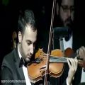 عکس تکنوازی بسیار زیبای ویلن در ارکستر سمفونیک عربی
