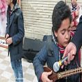 عکس سه تار نوازی دانش آموز 9ساله جهرمی
