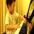 عکس پیانو کودک 4 ساله