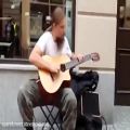 عکس موسیقی خیابانی : منحصر به فرد ترین گیتاریست خیابانی