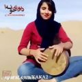 عکس تنبک نوازی دختر ایرانی در دل کویر