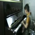 عکس پیانو امیر مسعود 10 ساله