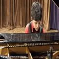عکس پیانوزدن حرفه ای از کودک۸ساله