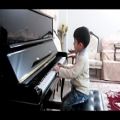 عکس پیانو زدن کودک